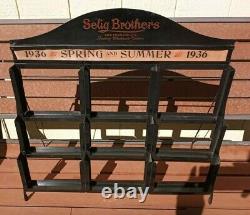 1930s Selig Brothers Tailors San Francisco apparel store display rack sign