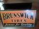Brunswick Tires Advertising Sign Orange Black Famous for Quality Store Display