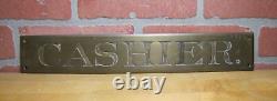 CASHIER Original Old Brass Impressed Lettering Bevel Edge Store Display Ad Sign