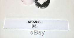 CHANEL roll of wrapping paper ribbon and store display sign