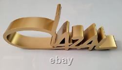 Cazal Large 3d Logo Display Plaque In Gold Plexiglass