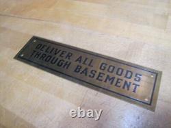 DELIVER ALL GOODS THROUGH BASEMENT Original Old Brass Store Display Sign