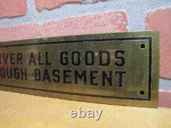 DELIVER ALL GOODS THROUGH BASEMENT Original Old Brass Store Display Sign