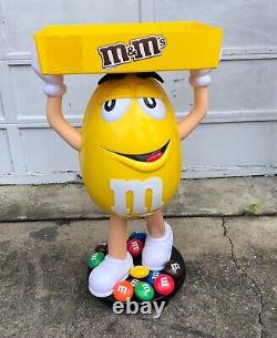 M&M Yellow Character Candy Store Display with Storage Tray Rolling Wheels NIB