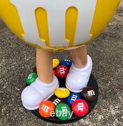 M&M Yellow Character Candy Store Display with Storage Tray Rolling Wheels NIB