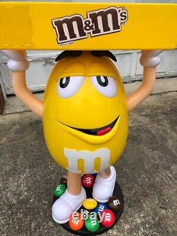 M&M Yellow Character Candy Store Display with Storage Tray Rolling Wheels NIB