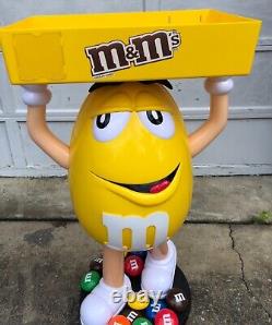 M&M Yellow Character Candy Store Display with Storage Tray Rolling Wheels NIB