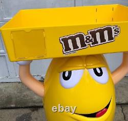 M&M Yellow Character Candy Store Display with Storage Tray Rolling Wheels NIB