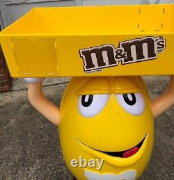 M&M Yellow Character Candy Store Display with Storage Tray Rolling Wheels NIB