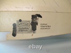 RED BALL 1960s Plyrons woman raincoat umbrella shoe store display sign splashin