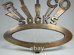 RITCO SOCKS Old Bronze Clothing Department General Store Display Sign Brass Wash