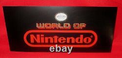 Rare NOS WORLD OF NINTENDO Store Display Sign 15 x 6.75