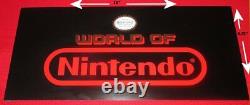 Rare NOS WORLD OF NINTENDO Store Display Sign 15 x 6.75