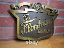 The FLORSHEIM SHOE Old Brass Department Store Display Advertising Sign Embossed