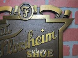 The FLORSHEIM SHOE Old Brass Department Store Display Advertising Sign Embossed