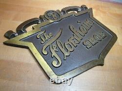 The FLORSHEIM SHOE Old Brass Department Store Display Advertising Sign Embossed