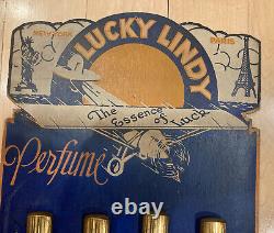 Vintage Cardboard Lucky Lindy Perfume Display Sign Airplane Charles Lindbergh