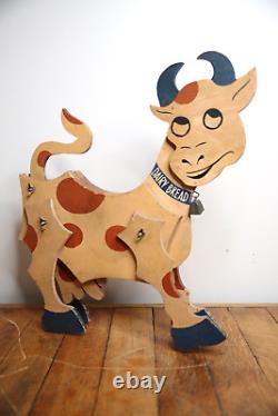 Vintage Dairy Farm Cow wood trade sign store display articulating folk art bell