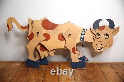 Vintage Dairy Farm Cow wood trade sign store display articulating folk art bell