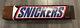 Vintage Snickers Candy Bar Plastic Store Display Sign 32 x 7